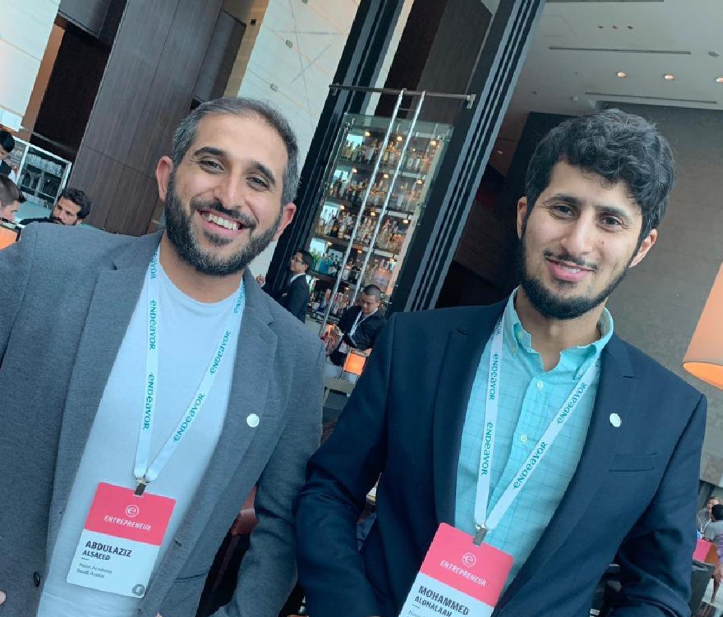 Dr. Abdulaziz AlSaeed stands alongside Mohammed Aldhalaan in Japan, celebrating their selection as Endeavor Global Entrepreneurs